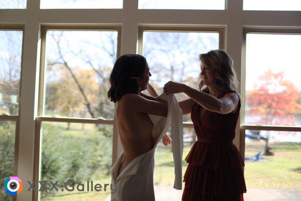 Mom helping with the dress.