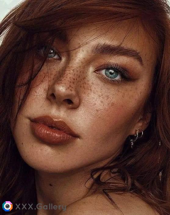 Freckled face blue eyed redhead