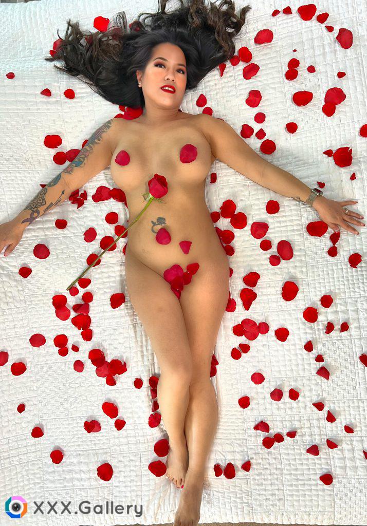 Happy Valentine’s Day, nude on a bed of roses!