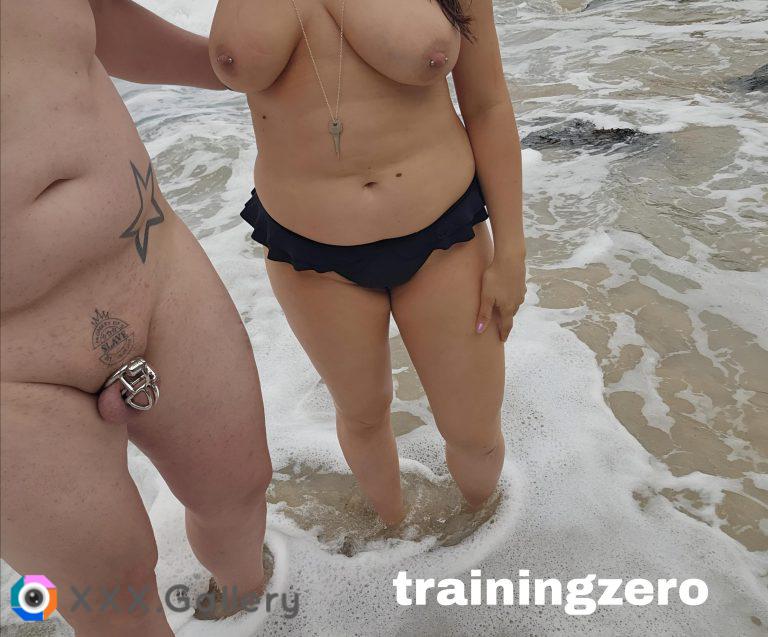 I took him to the beach and told him to strip so he could show off his little caged cock