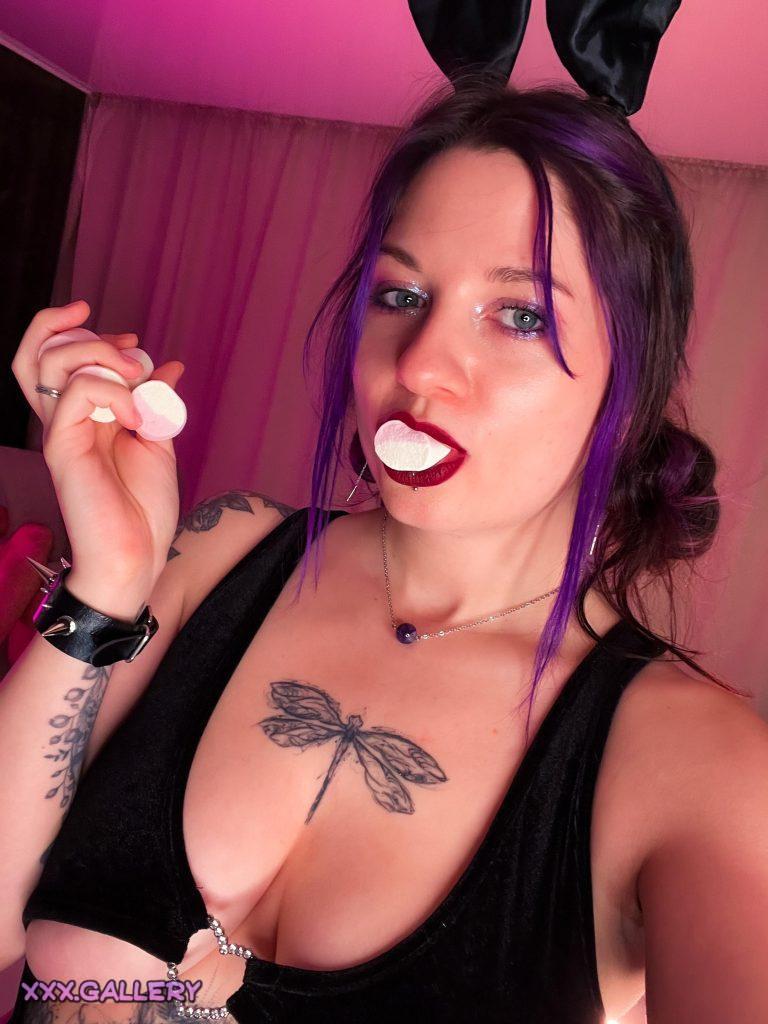 Neon haired beauty enjoys some sweet treats