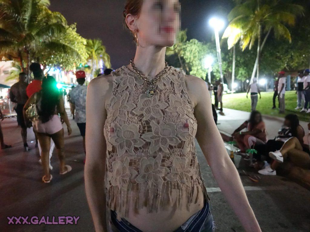 Walking along the famous beach strip with a revealing outfit